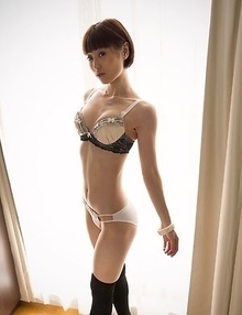 Mizuki poses in her lingerie in a sun-lit room before stripping naked for you